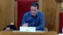 Labour councillor Andrew Achilleos speaks to an overview and scrutiny committee meeting