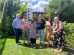 Council leader Dominic Twomey (left) and cabinet member for housing Maureen Worby (right) with winners Abul and Nour, sponsor David from Chandlers Roofing Supplies, and housing officer Emma