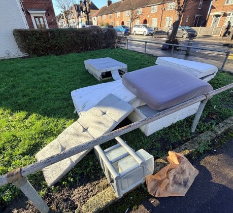 Mattresses and furniture dumped on the street