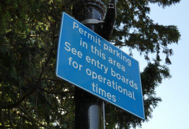 A permit parking sign